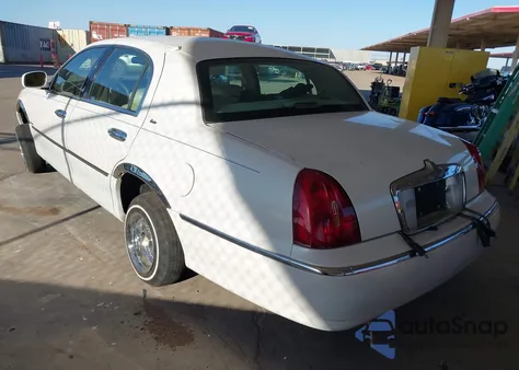 1998 Lincoln Town Car Cartier from USA, damaged, VIN 1LNFM83W7WY734122
